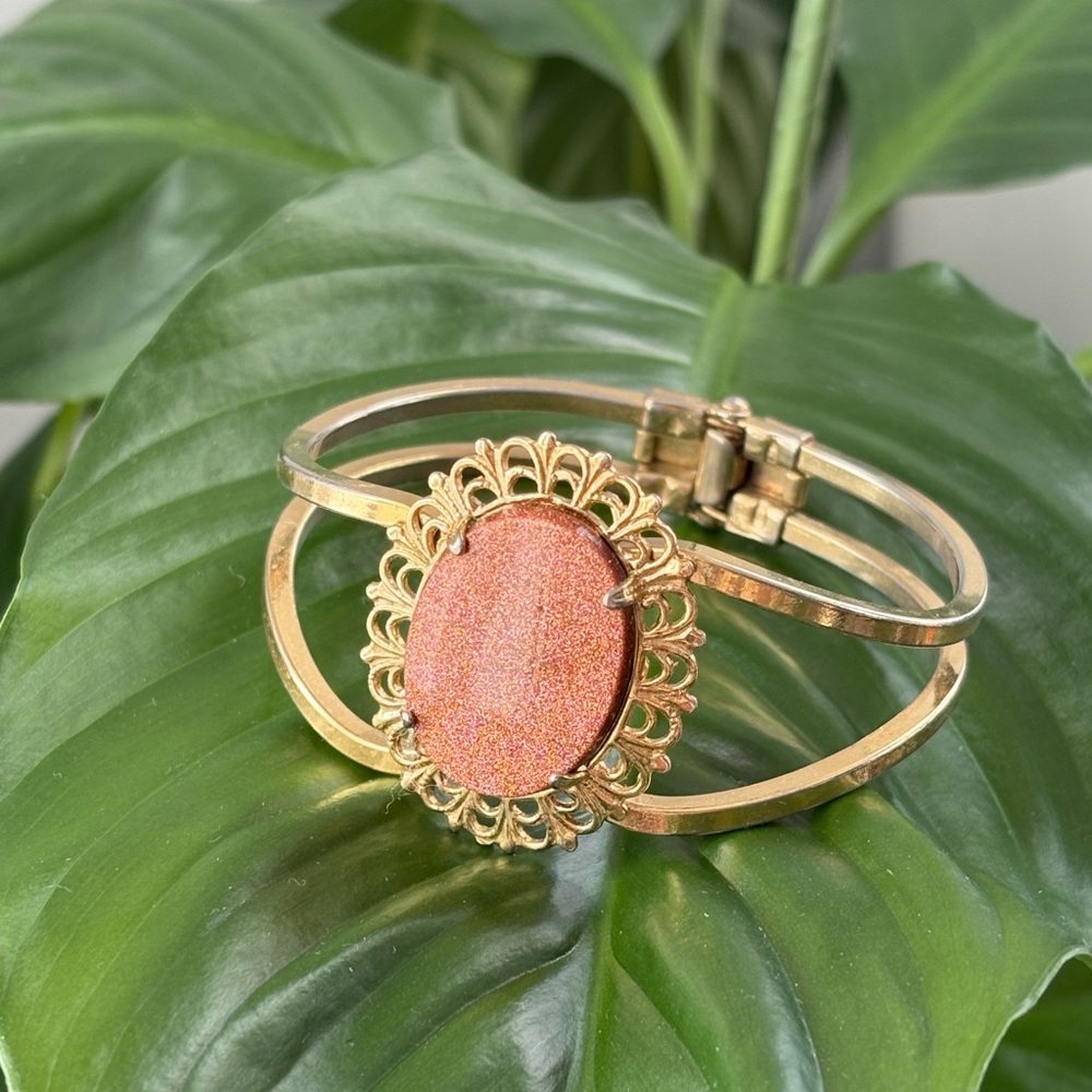 Elegant Gold and Orange Bracelet